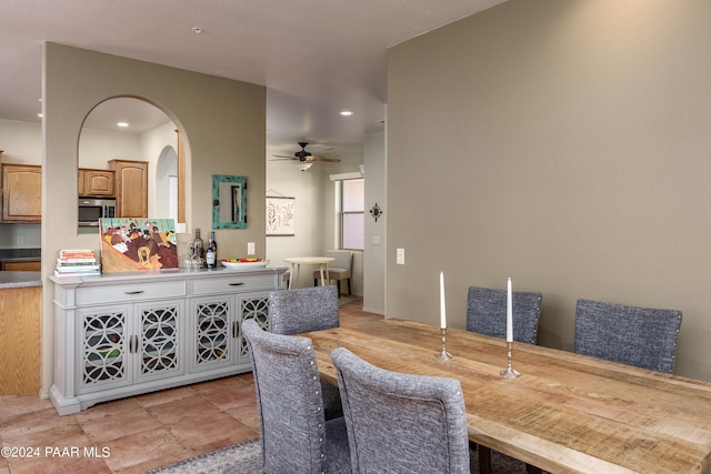 dining space featuring ceiling fan