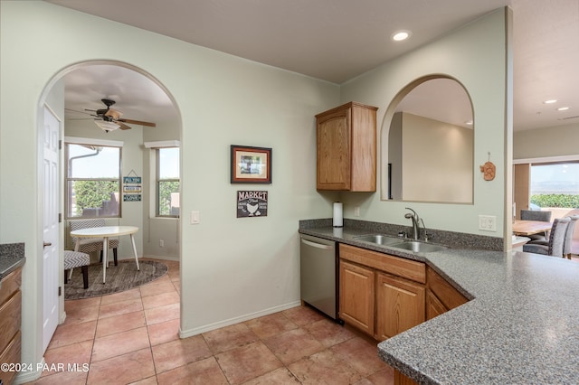 kitchen featuring dishwasher, ceiling fan, a healthy amount of sunlight, and sink