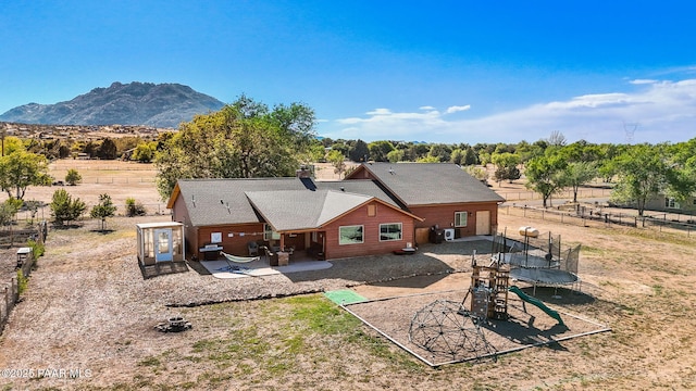 1501 W Kelly Dr, Prescott, AZ 86305 - aerial view of property and surrounding area with a mountainous background