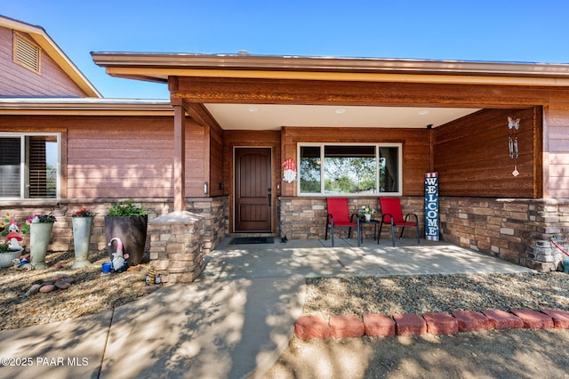 1501 W Kelly Dr, Prescott, AZ 86305 - view of exterior entry with covered porch and stone siding