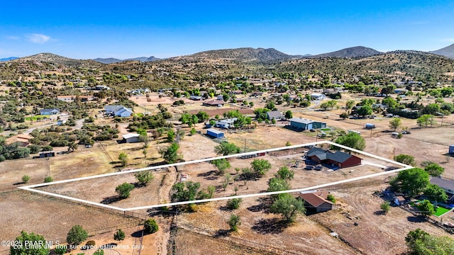 1501 W Kelly Dr, Prescott, AZ 86305 - aerial overview of property's location with property parcel outlined and a mountain backdrop