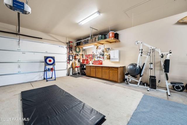 1501 W Kelly Dr, Prescott, AZ 86305 - garage with a garage door opener and a workshop area