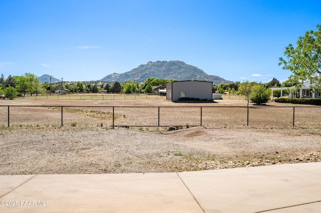 1501 W Kelly Dr, Prescott, AZ 86305 - view of yard with a mountain view, a view of rural / pastoral area, and an outdoor structure