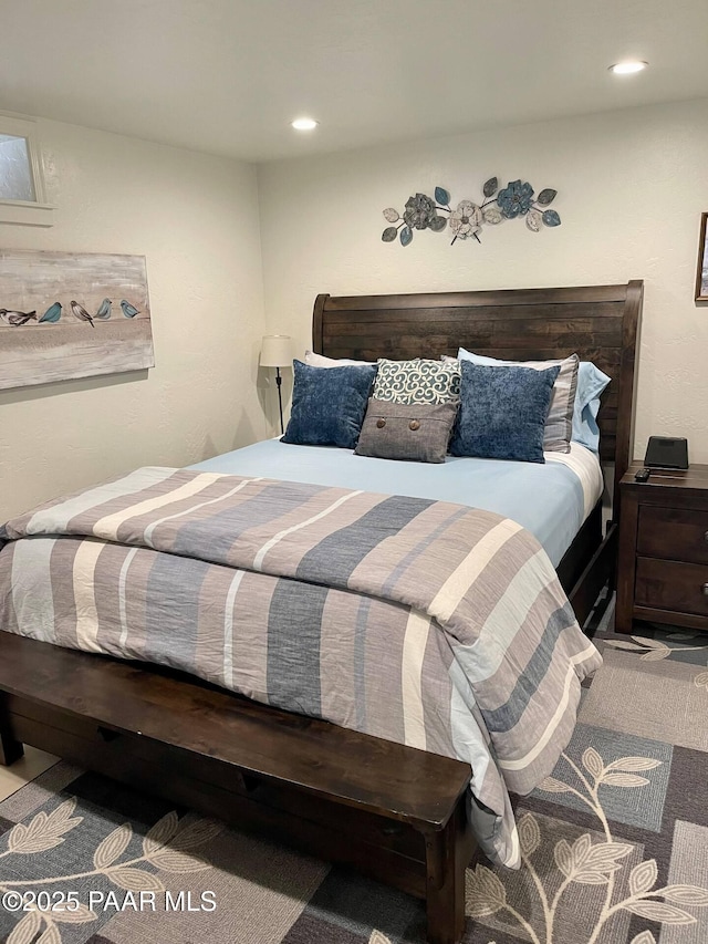 bedroom featuring recessed lighting and carpet flooring