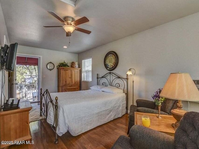 bedroom with access to exterior, ceiling fan, and wood finished floors