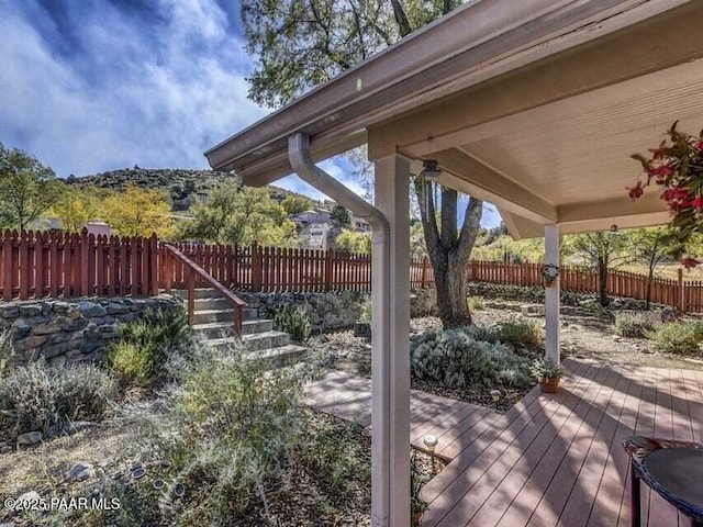 wooden deck featuring fence