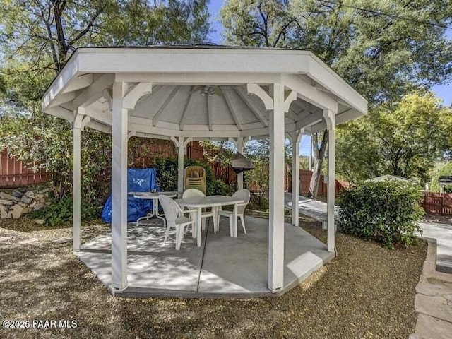 view of patio featuring a gazebo and fence