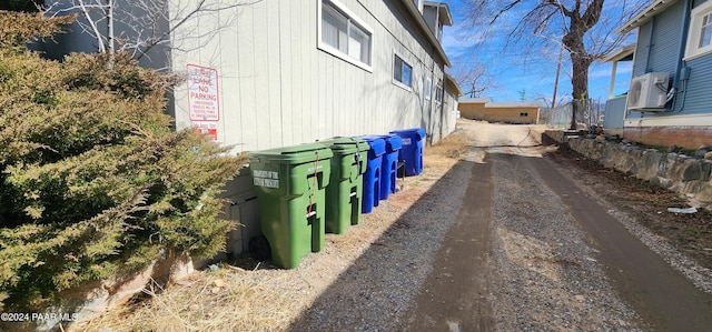 view of side of property with cooling unit