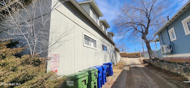 view of home's exterior with cooling unit