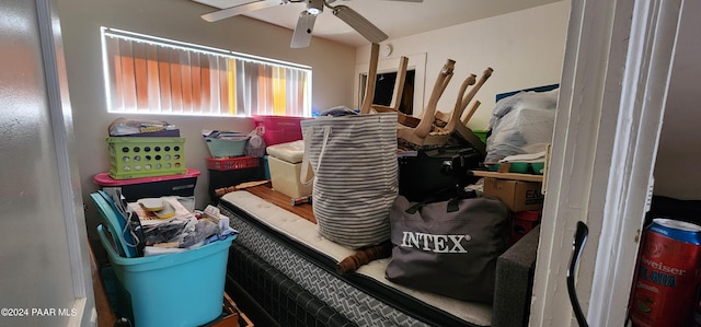 storage area featuring ceiling fan