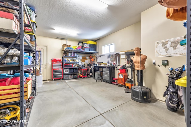 garage with a workshop area