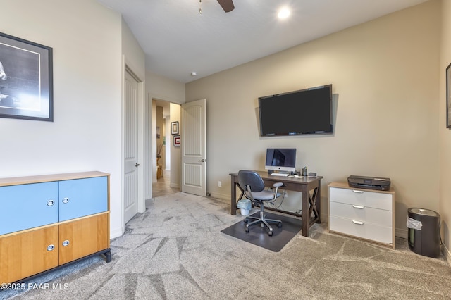 office featuring baseboards, carpet floors, and ceiling fan