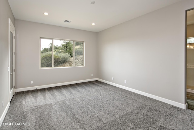 view of carpeted spare room