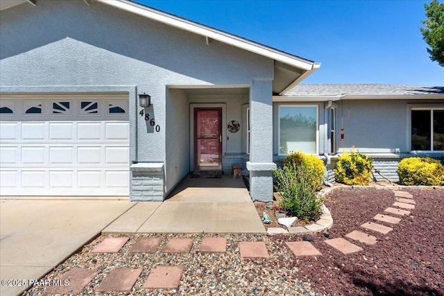 4860 N Treasure Cir, Prescott Valley, AZ 86314 - view of front of house with stucco siding and a garage