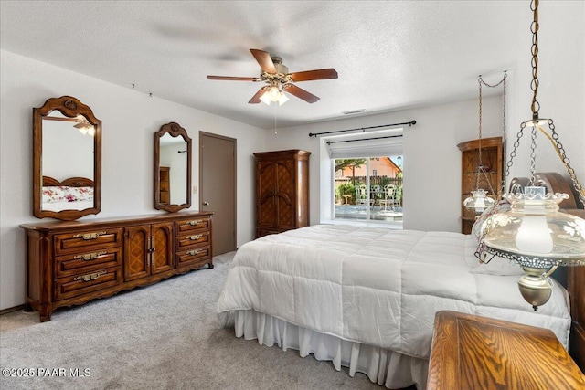 4860 N Treasure Cir, Prescott Valley, AZ 86314 - bedroom featuring carpet, ceiling fan, access to outside, and a textured ceiling
