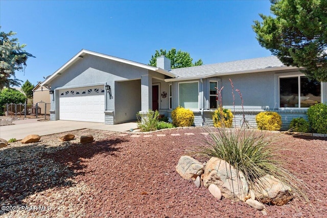 4860 N Treasure Cir, Prescott Valley, AZ 86314 - ranch-style home with a chimney, an attached garage, stucco siding, and concrete driveway