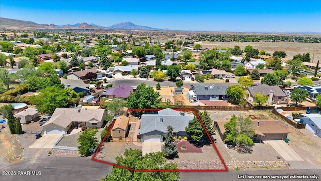 4860 N Treasure Cir, Prescott Valley, AZ 86314 - aerial perspective of suburban area featuring property parcel outlined and a mountain backdrop