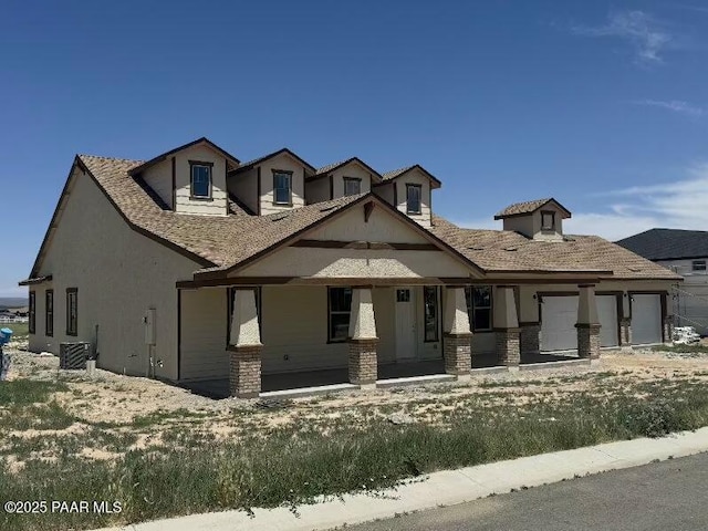2545 Connor Ave, Chino Valley, AZ 86323 - view of front of property with covered porch, stucco siding, and central AC