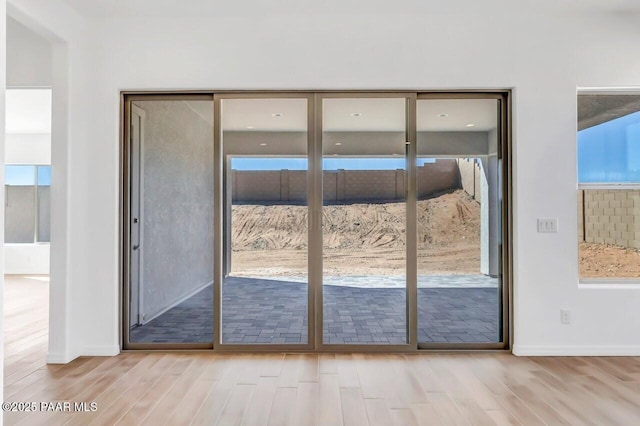 doorway featuring light hardwood / wood-style flooring