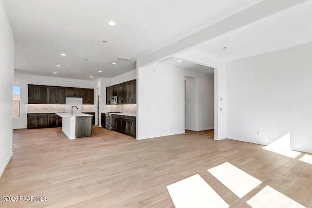 interior space with sink and light wood-type flooring