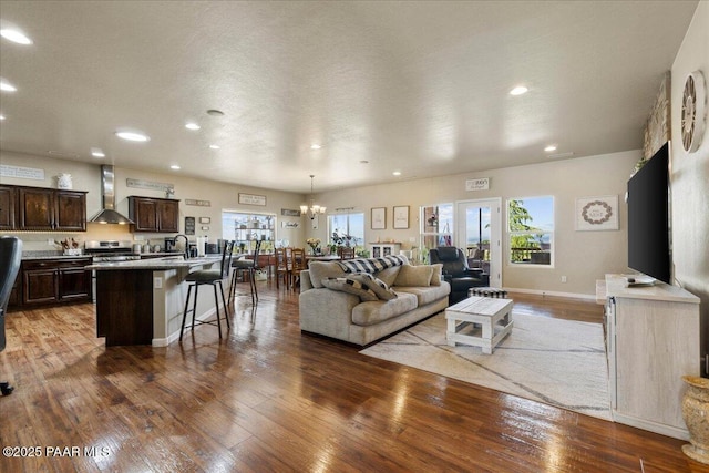 2360 W Bridle Path Rd, Prescott, AZ 86305 - living area featuring recessed lighting, hardwood / wood-style flooring, and a chandelier