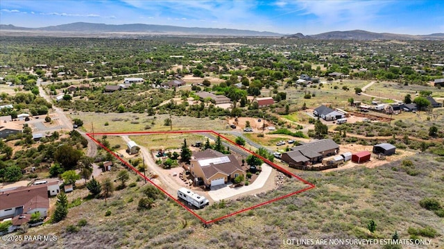 2360 W Bridle Path Rd, Prescott, AZ 86305 - aerial view of property and surrounding area with a mountain backdrop and property parcel outlined