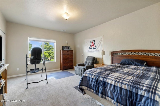 2360 W Bridle Path Rd, Prescott, AZ 86305 - bedroom featuring light colored carpet, baseboards, and a desk