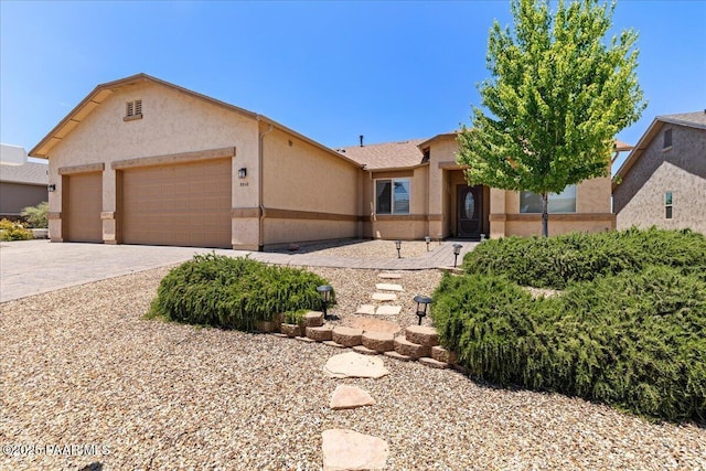 5510 N Foster Pl, Prescott Valley, AZ 86314 - single story home featuring stucco siding, an attached garage, and driveway