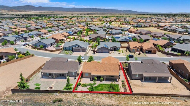 5510 N Foster Pl, Prescott Valley, AZ 86314 - aerial view of residential area featuring property parcel outlined and a mountainous background