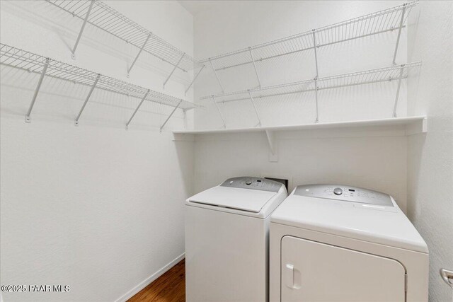 5510 N Foster Pl, Prescott Valley, AZ 86314 - laundry area featuring washer and dryer and wood finished floors