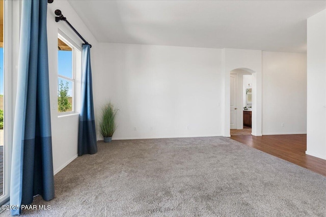 5510 N Foster Pl, Prescott Valley, AZ 86314 - carpeted spare room with arched walkways and baseboards