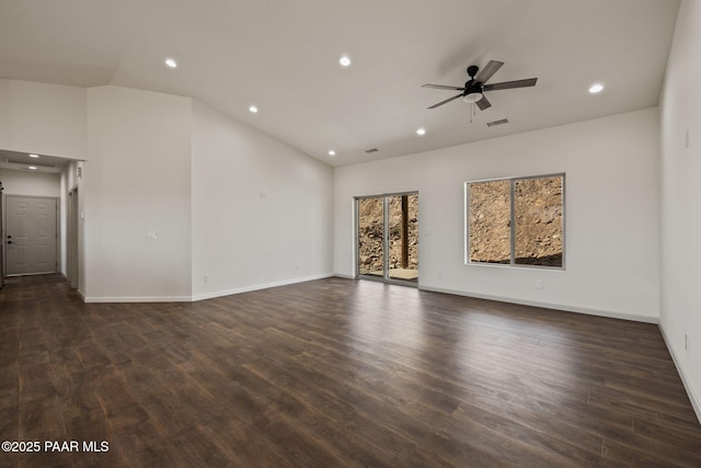 13555 E Soleil Down Rd, Mayer, AZ 86333 - unfurnished living room featuring recessed lighting, a ceiling fan, dark wood-style floors, and vaulted ceiling