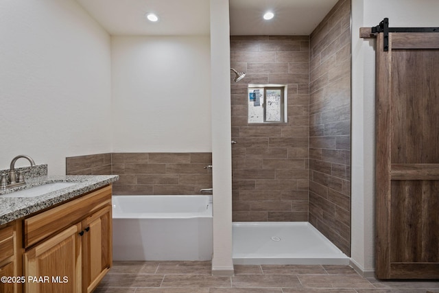 13555 E Soleil Down Rd, Mayer, AZ 86333 - bathroom with vanity, a garden tub, and a tile shower