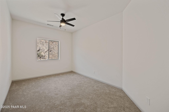 13555 E Soleil Down Rd, Mayer, AZ 86333 - carpeted spare room with a ceiling fan and baseboards