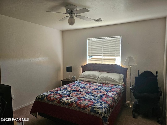 4825 E Sauter Dr, Prescott Valley, AZ 86314 - carpeted bedroom with ceiling fan, baseboards, and visible vents