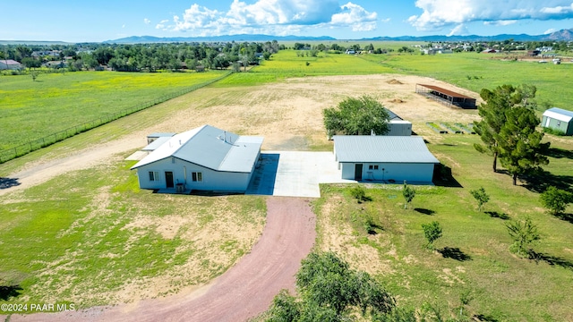 aerial view with a mountain view and a rural view