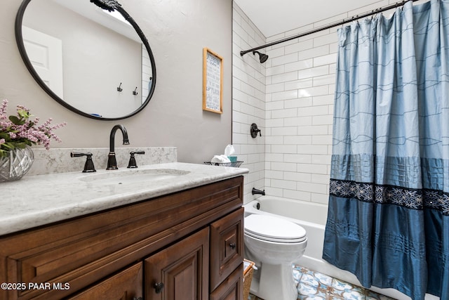 bathroom with vanity, shower / bath combo with shower curtain, and toilet