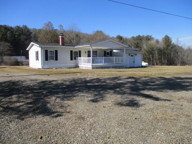 ranch-style house featuring a porch