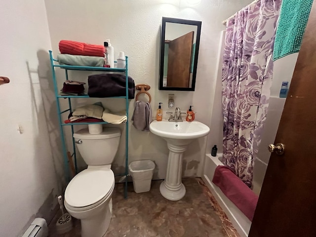 full bathroom with shower / bath combo, toilet, a baseboard heating unit, and sink