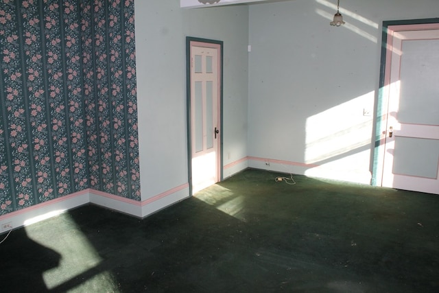 spare room with concrete flooring