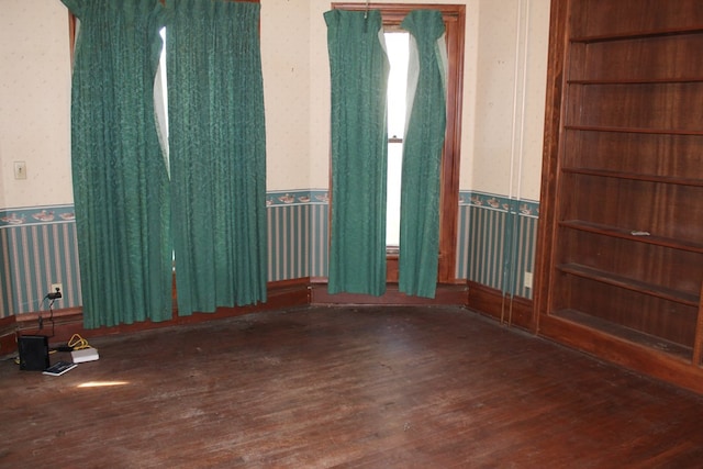 empty room featuring wood-type flooring