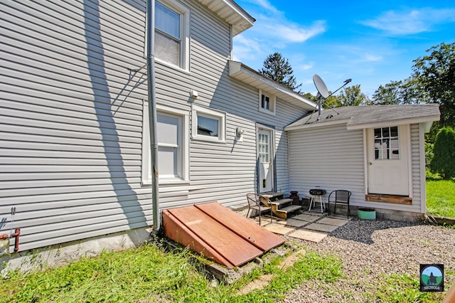 back of house with a patio area