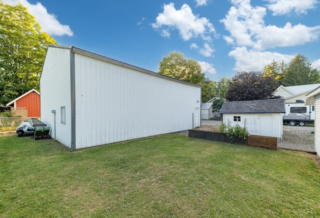 view of outdoor structure with a yard