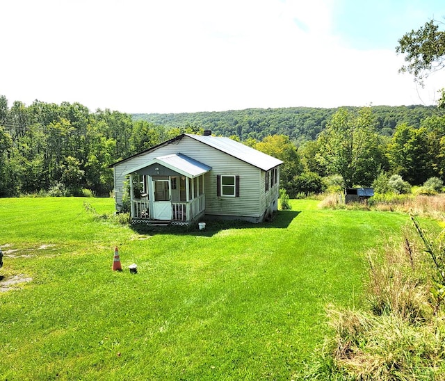 exterior space with a yard