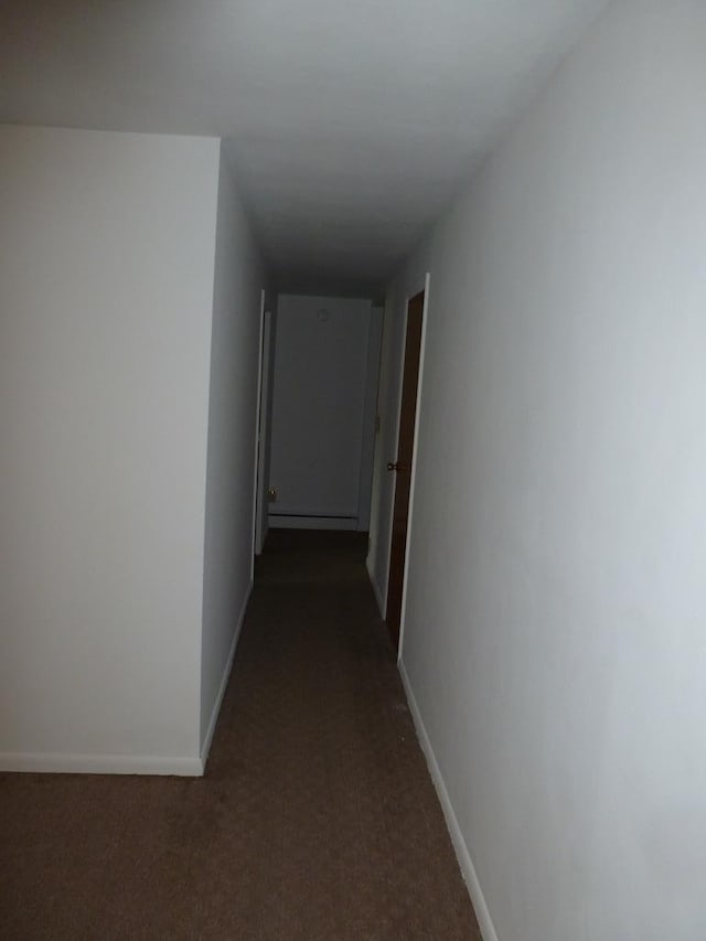 hall with dark carpet