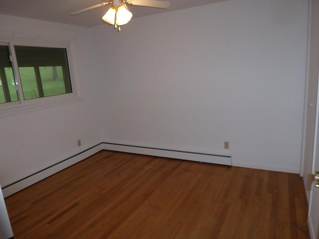 unfurnished room with wood-type flooring, ceiling fan, and baseboard heating