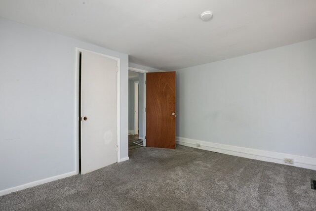 unfurnished bedroom with carpet flooring