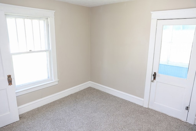 view of carpeted spare room