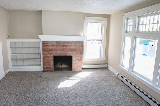 unfurnished living room featuring light carpet, a fireplace, a baseboard radiator, and a textured ceiling