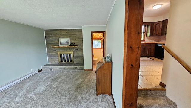 unfurnished living room featuring ornamental molding, a textured ceiling, baseboard heating, a large fireplace, and light carpet